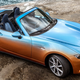 Illustration for article titled Placate Your Fears Of Global Economic Collapse With This Two-Tone Miata With A Denim Interior